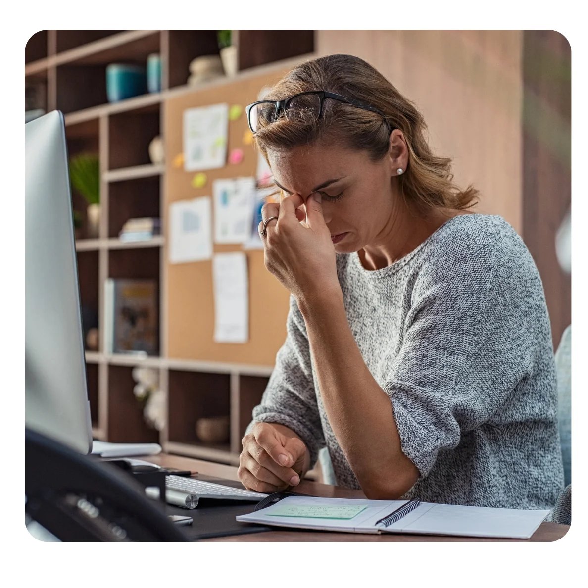 Stressed professional at workplace